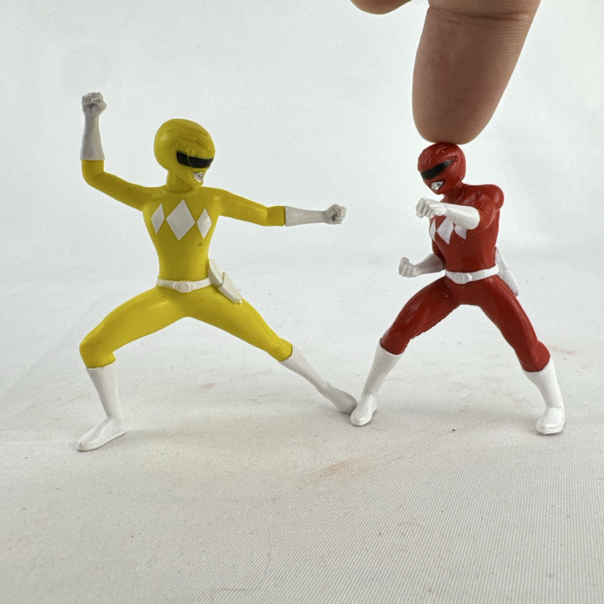 Hasbro 2021 Mighty Morphin Power Rangers Red and Yellow Ranger PVC mini figures standing in battle poses