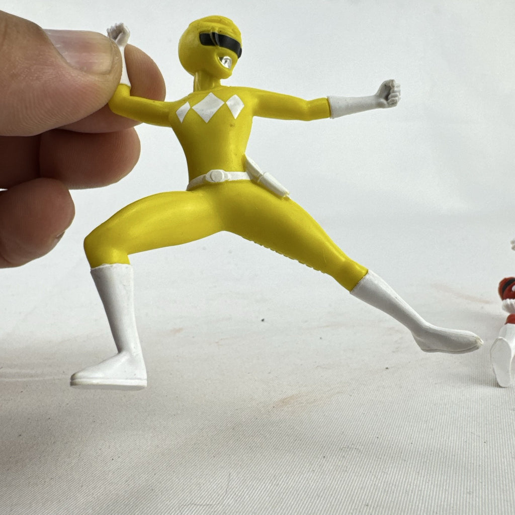 Hasbro 2021 Mighty Morphin Power Rangers Red and Yellow Ranger PVC mini figures standing in battle poses