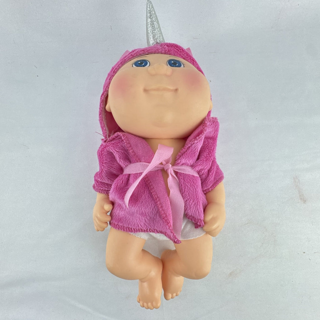 Cabbage Patch Kids 9-inch vinyl baby doll wearing a hooded pink unicorn robe with silver horn