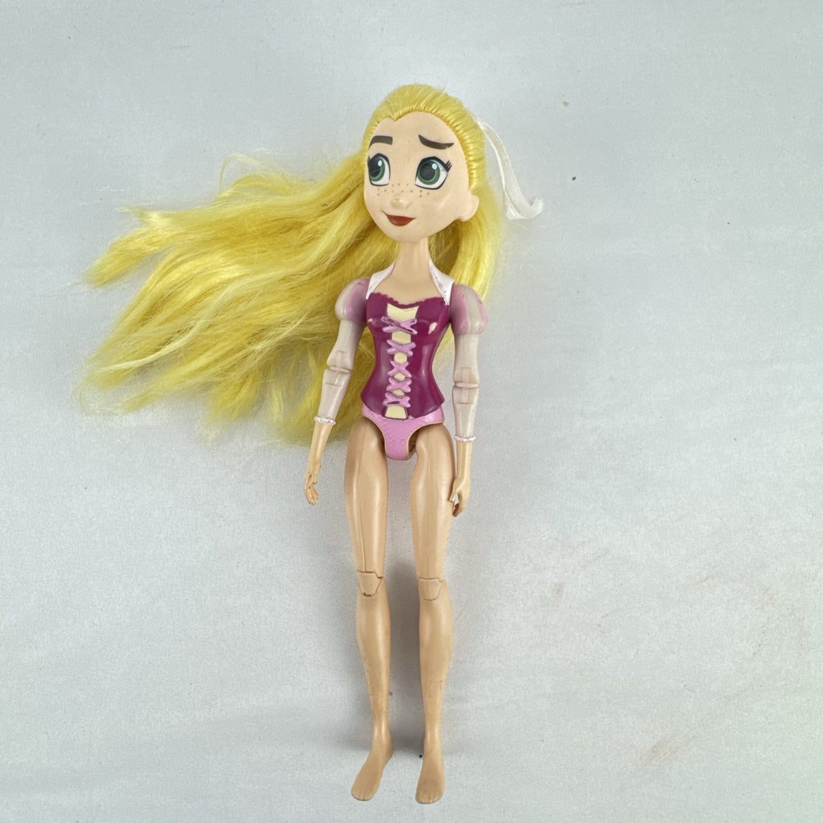 Hasbro Tangled The Series Rapunzel 8.5-inch articulated plastic doll with blonde hair