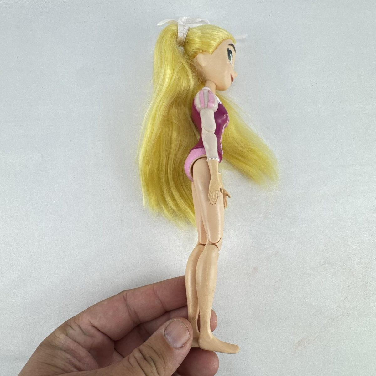 Hasbro Tangled The Series Rapunzel 8.5-inch articulated plastic doll with blonde hair