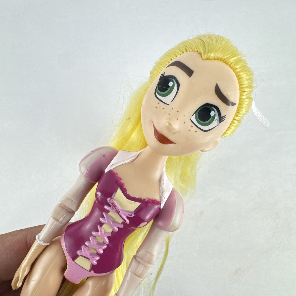 Hasbro Tangled The Series Rapunzel 8.5-inch articulated plastic doll with blonde hair