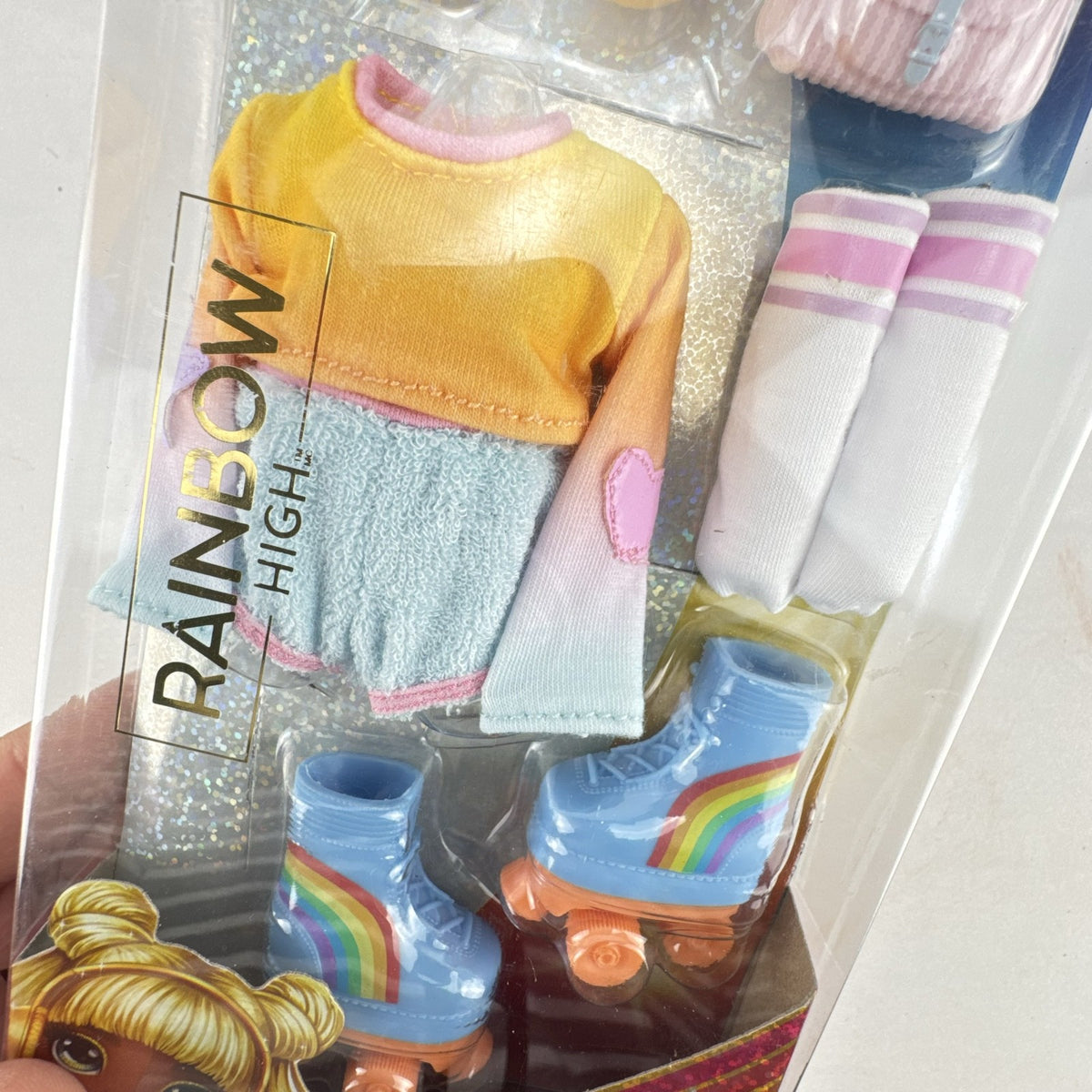 Rainbow High Skate Social fashion pack with crop top, shorts, and roller skates in original packaging
