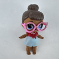 MGA L.O.L. Surprise! 3-inch doll with brown hair bun, pink glitter cat-eye glasses, and red tie-front outfit