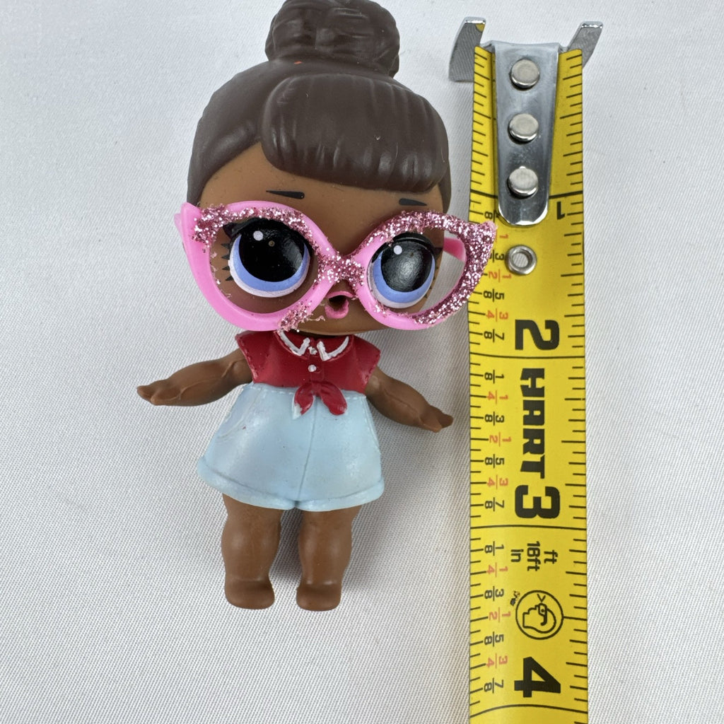 MGA L.O.L. Surprise! 3-inch doll with brown hair bun, pink glitter cat-eye glasses, and red tie-front outfit