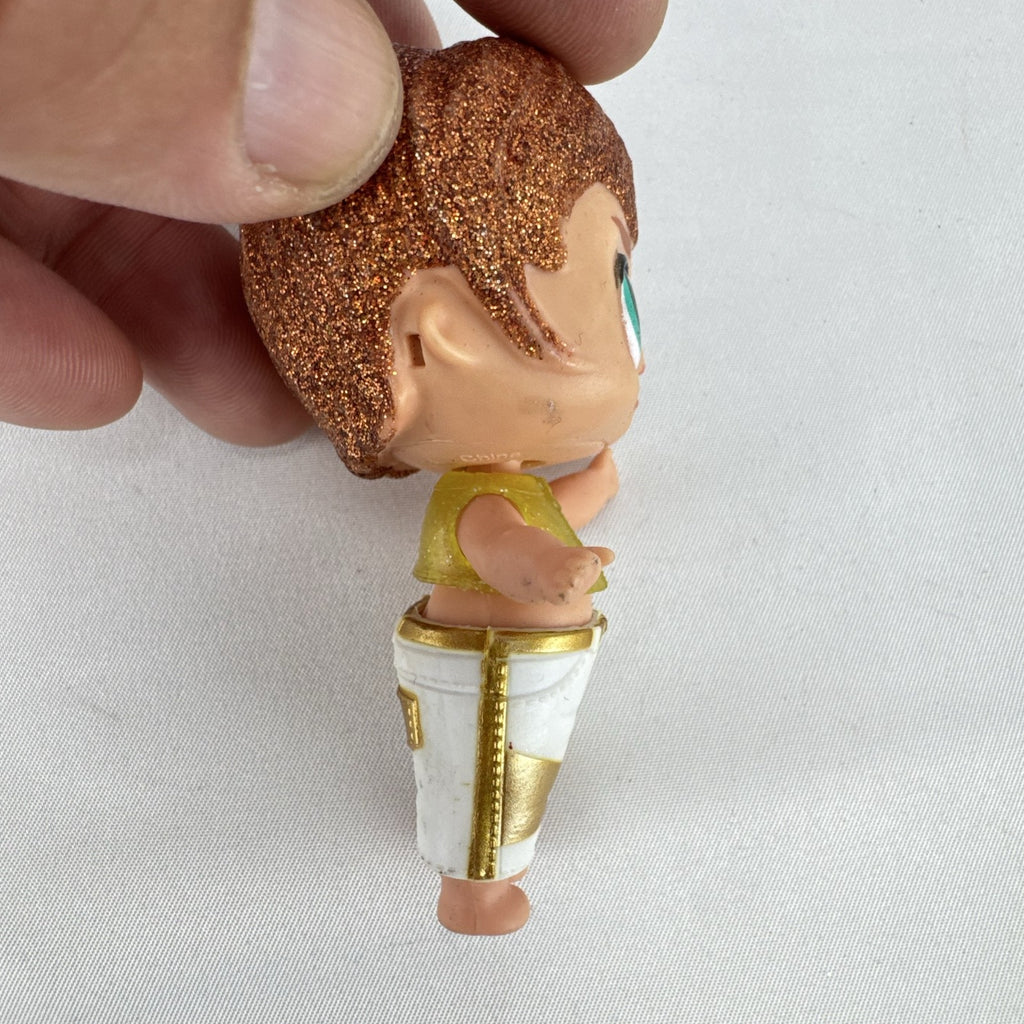MGA L.O.L. Surprise! Boys His Royal High-Ness doll with glitter hair and gold outfit