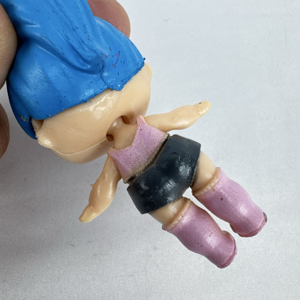 Front view of 3-inch L.O.L. Surprise style Center Stage mini doll figure with blue sculpted hair and pink boots