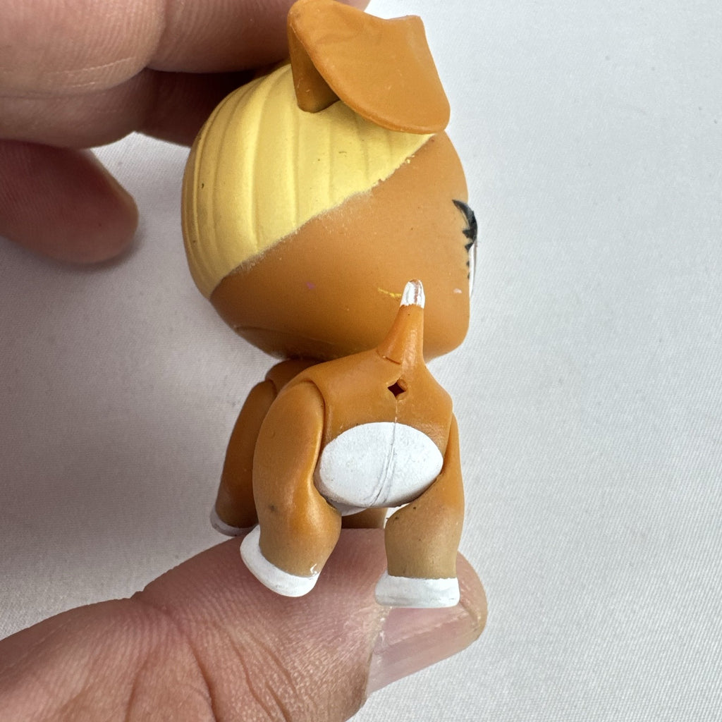 MGA L.O.L. Surprise! Pets brown vinyl dog figure with molded blonde topknot bun