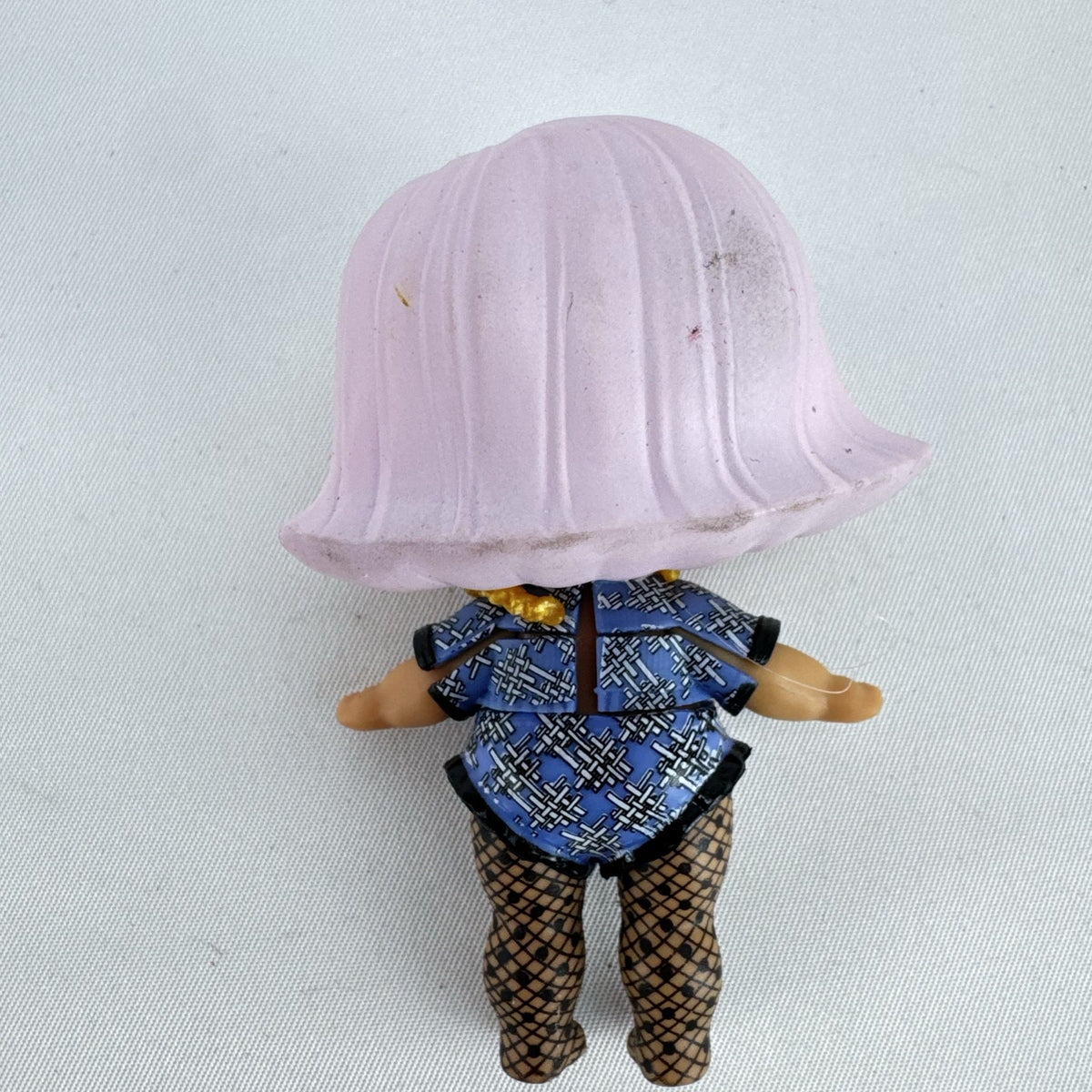 MGA L.O.L. Surprise Madame Queen 3-inch doll in blue houndstooth outfit with pink hair