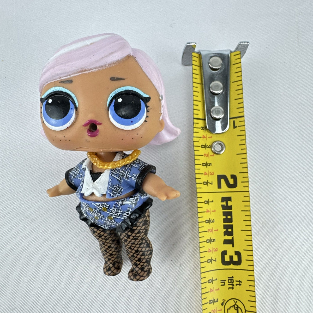 MGA L.O.L. Surprise Madame Queen 3-inch doll in blue houndstooth outfit with pink hair