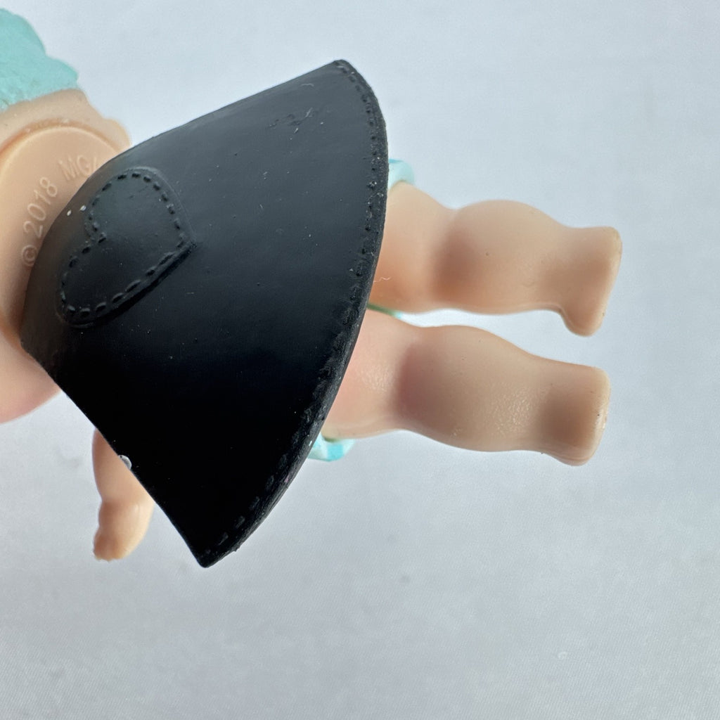 MGA Entertainment L.O.L. Surprise! The Great Baby doll with curly turquoise hair, top hat headband, and black cape.