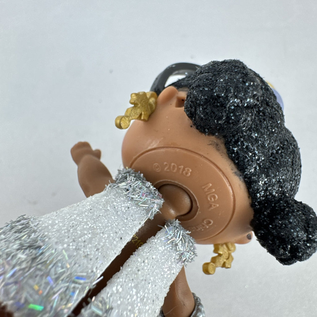 MGA L.O.L. Surprise 3-inch doll with black glitter hair buns and silver tinsel dress