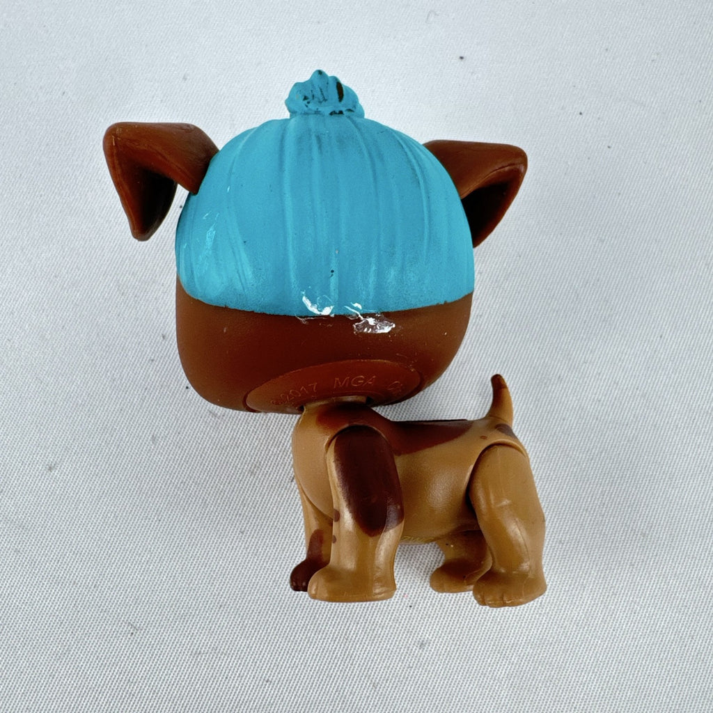 MGA L.O.L. Surprise! Pets brown puppy figure with teal blue hair and purple eyes