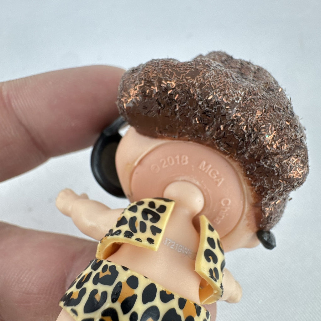 MGA L.O.L. Surprise! 3-inch doll wearing leopard print outfit, cat-eye sunglasses, and boots with brown glitter hair