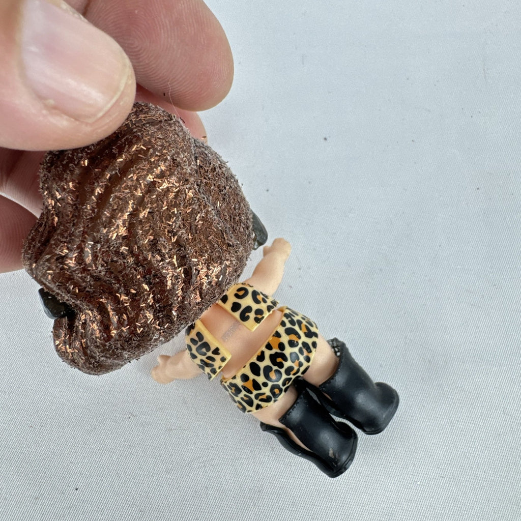 MGA L.O.L. Surprise! 3-inch doll wearing leopard print outfit, cat-eye sunglasses, and boots with brown glitter hair