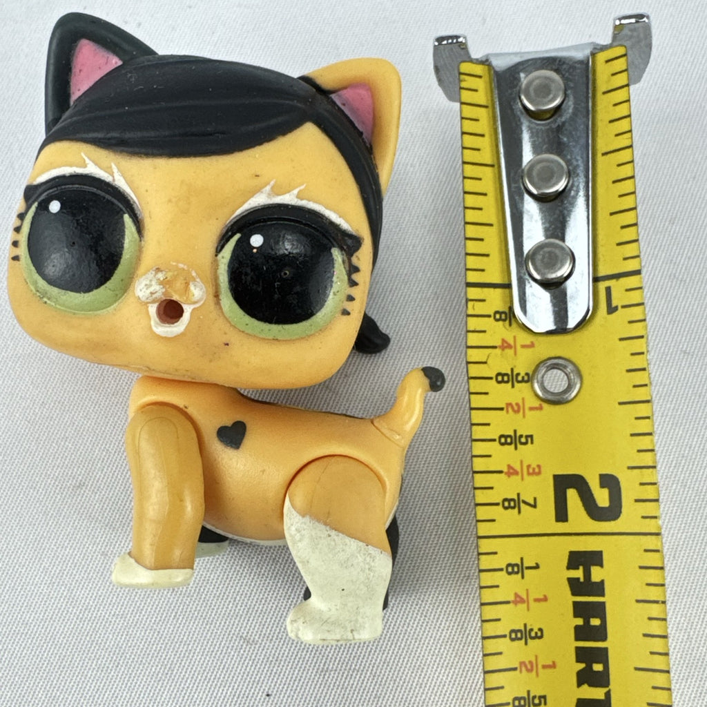 MGA L.O.L. Surprise! Pets 2-inch calico cat vinyl figure with black braided pigtails and green eyes