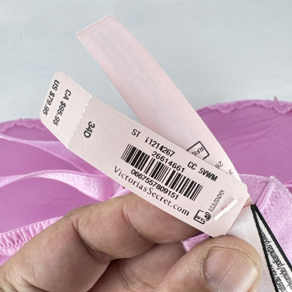Victoria's Secret size 34D pink mesh lightly lined underwire bra with multicolor floral embroidery.