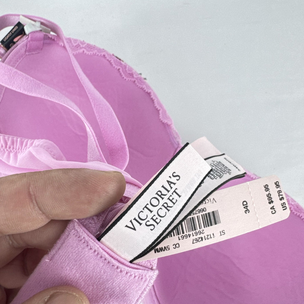 Victoria's Secret size 34D pink mesh lightly lined underwire bra with multicolor floral embroidery.