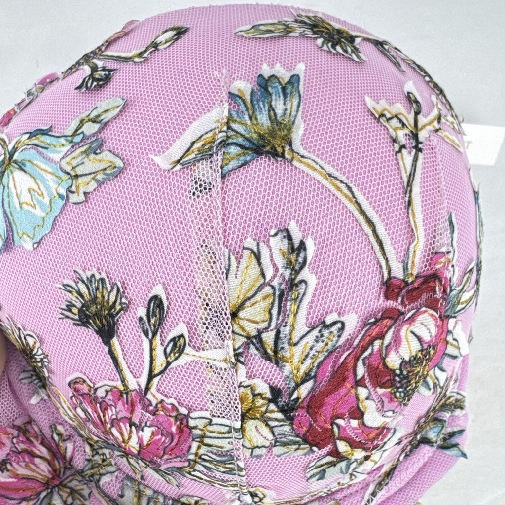 Victoria's Secret size 34D pink mesh lightly lined underwire bra with multicolor floral embroidery.