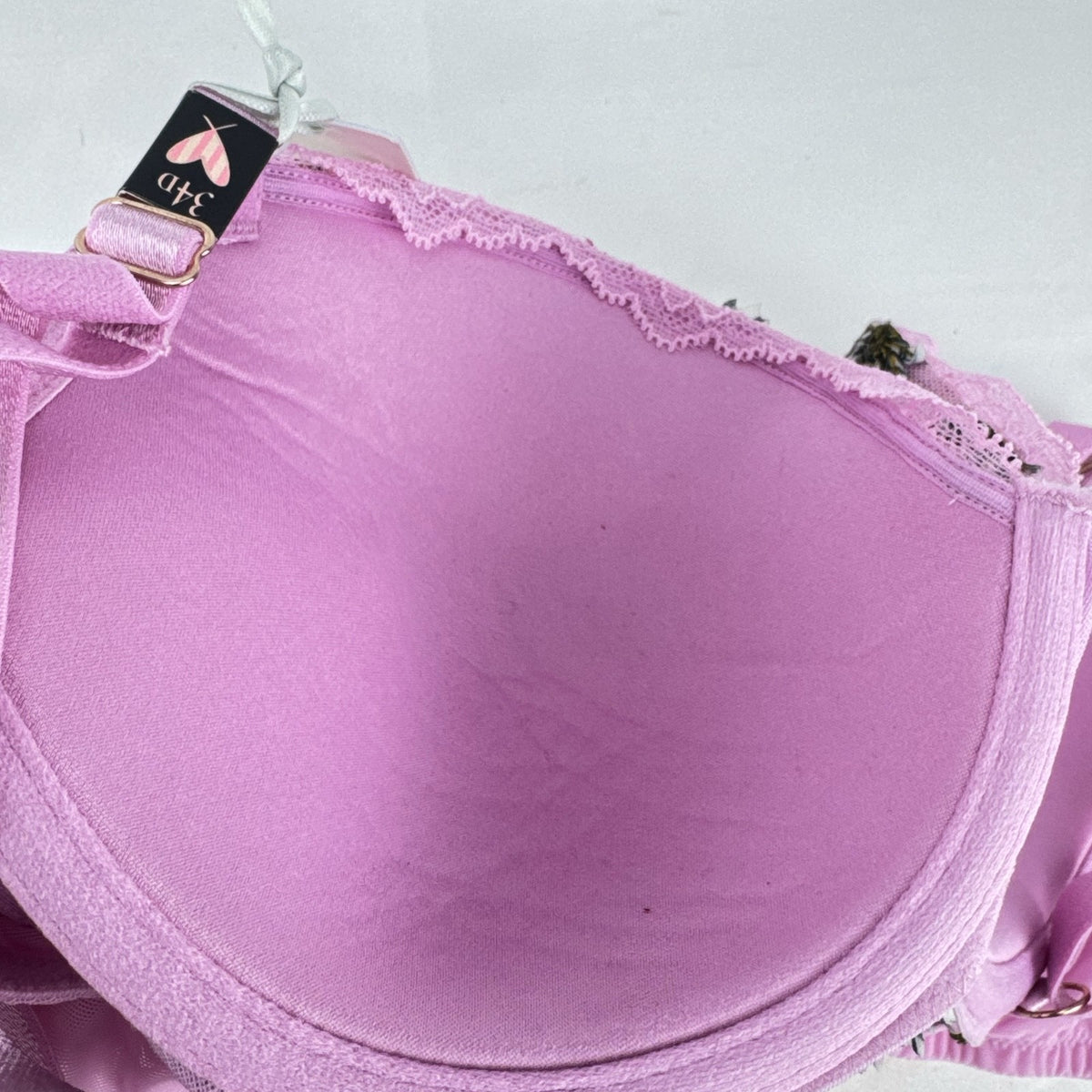 Victoria's Secret size 34D pink mesh lightly lined underwire bra with multicolor floral embroidery.