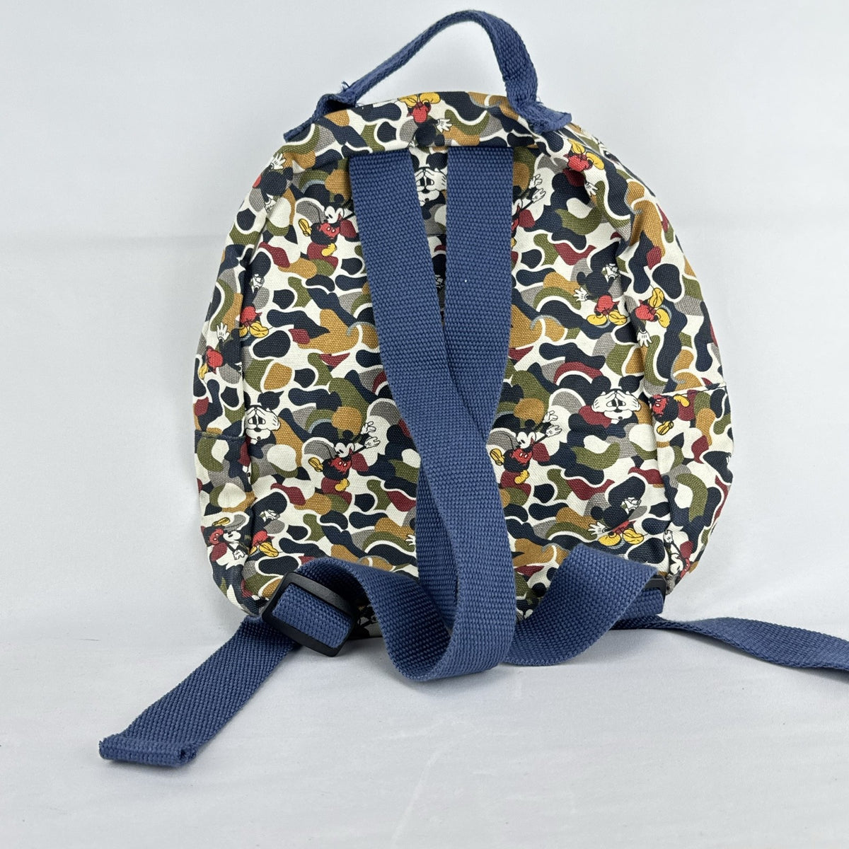 Zara Disney Mickey Mouse mini backpack in multicolor camouflage canvas with front rubber graphic