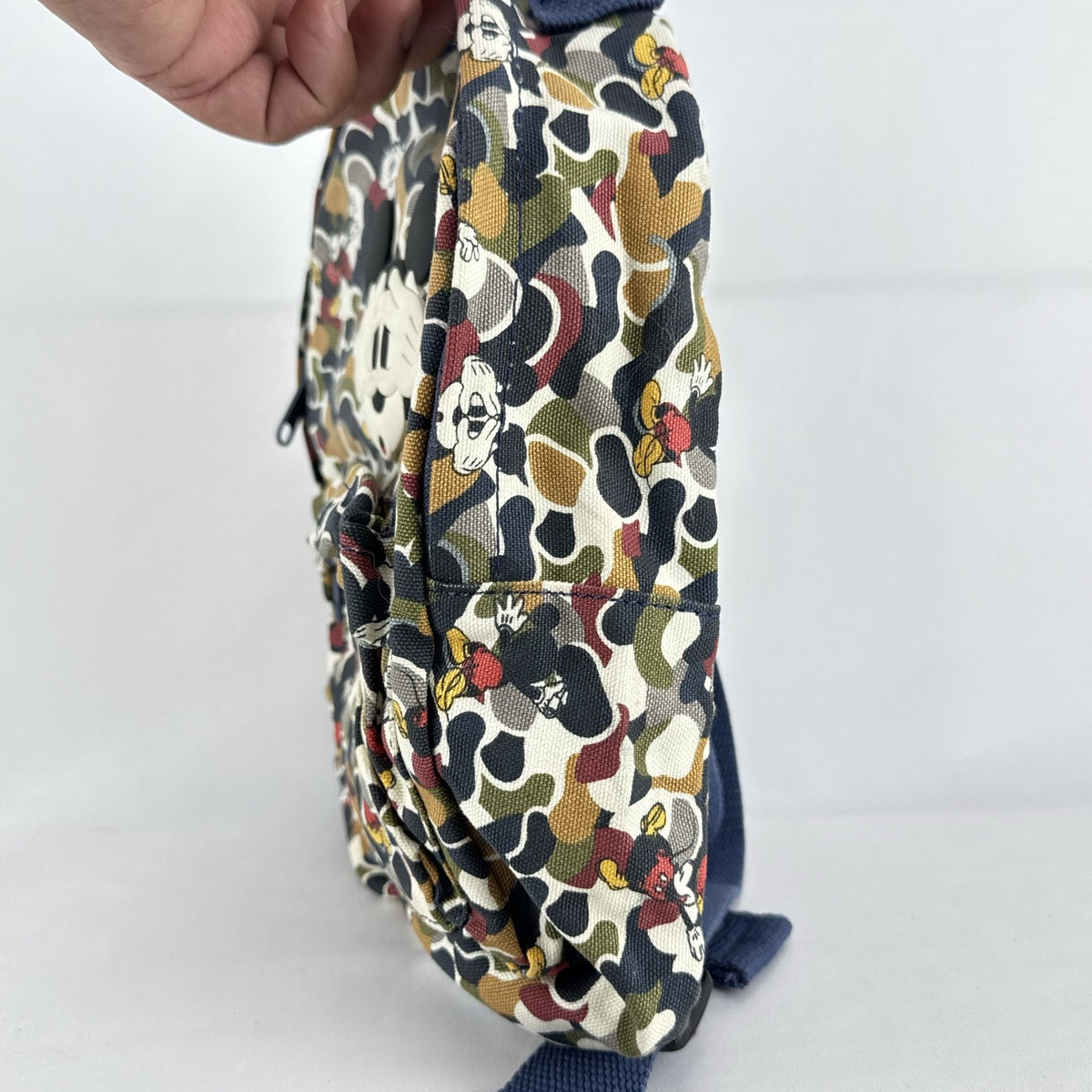 Zara Disney Mickey Mouse mini backpack in multicolor camouflage canvas with front rubber graphic