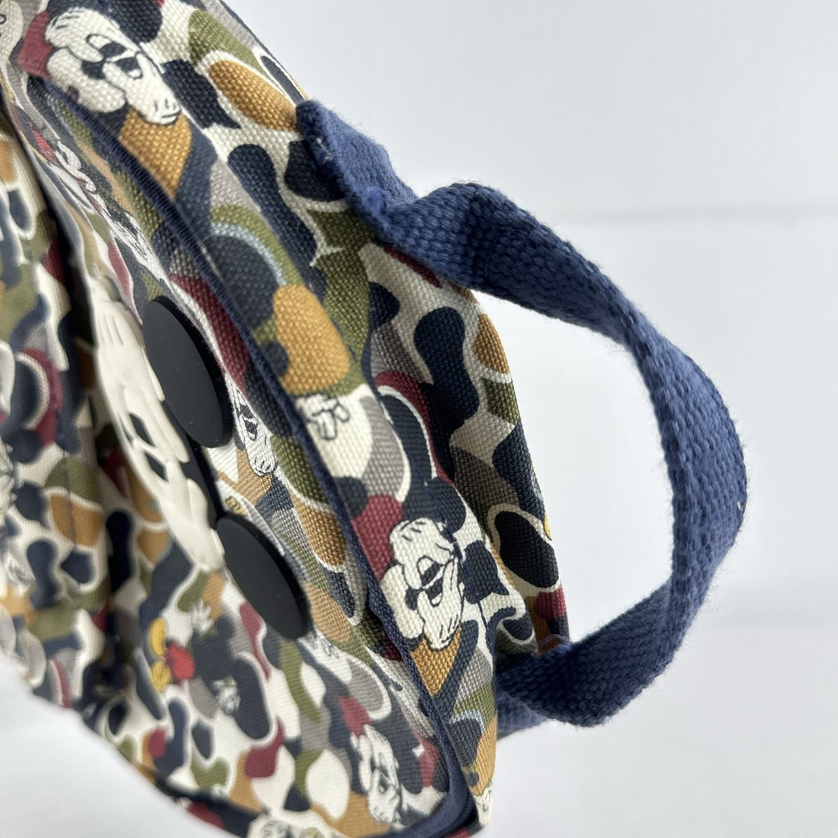 Zara Disney Mickey Mouse mini backpack in multicolor camouflage canvas with front rubber graphic