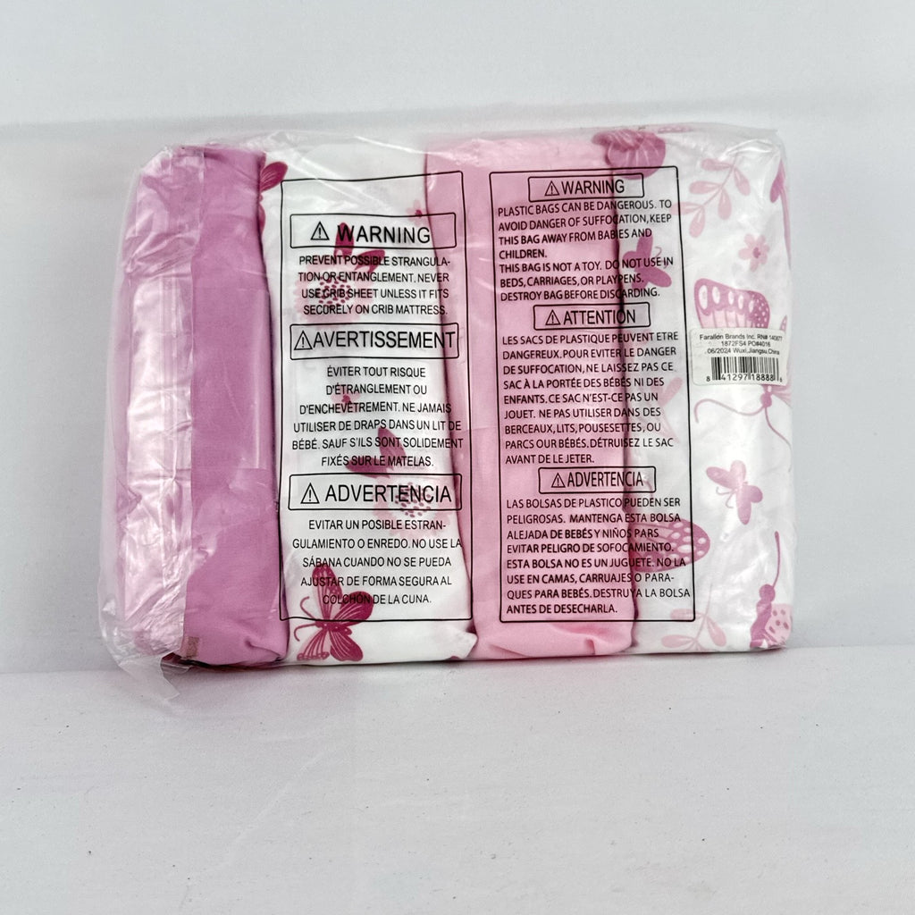 The Peanutshell 4-pack pink floral and butterfly microfiber fitted crib sheets in original packaging