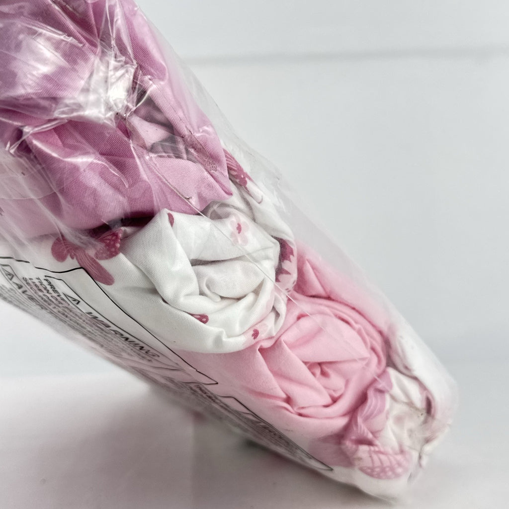 The Peanutshell 4-pack pink floral and butterfly microfiber fitted crib sheets in original packaging