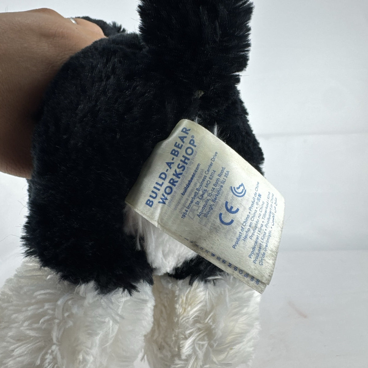 Build-A-Bear Workshop Promise Pets black and white puppy plush dog with collar, 12-inch.