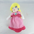 Nintendo Super Mario Princess Peach 11-inch plush doll wearing pink dress and crown
