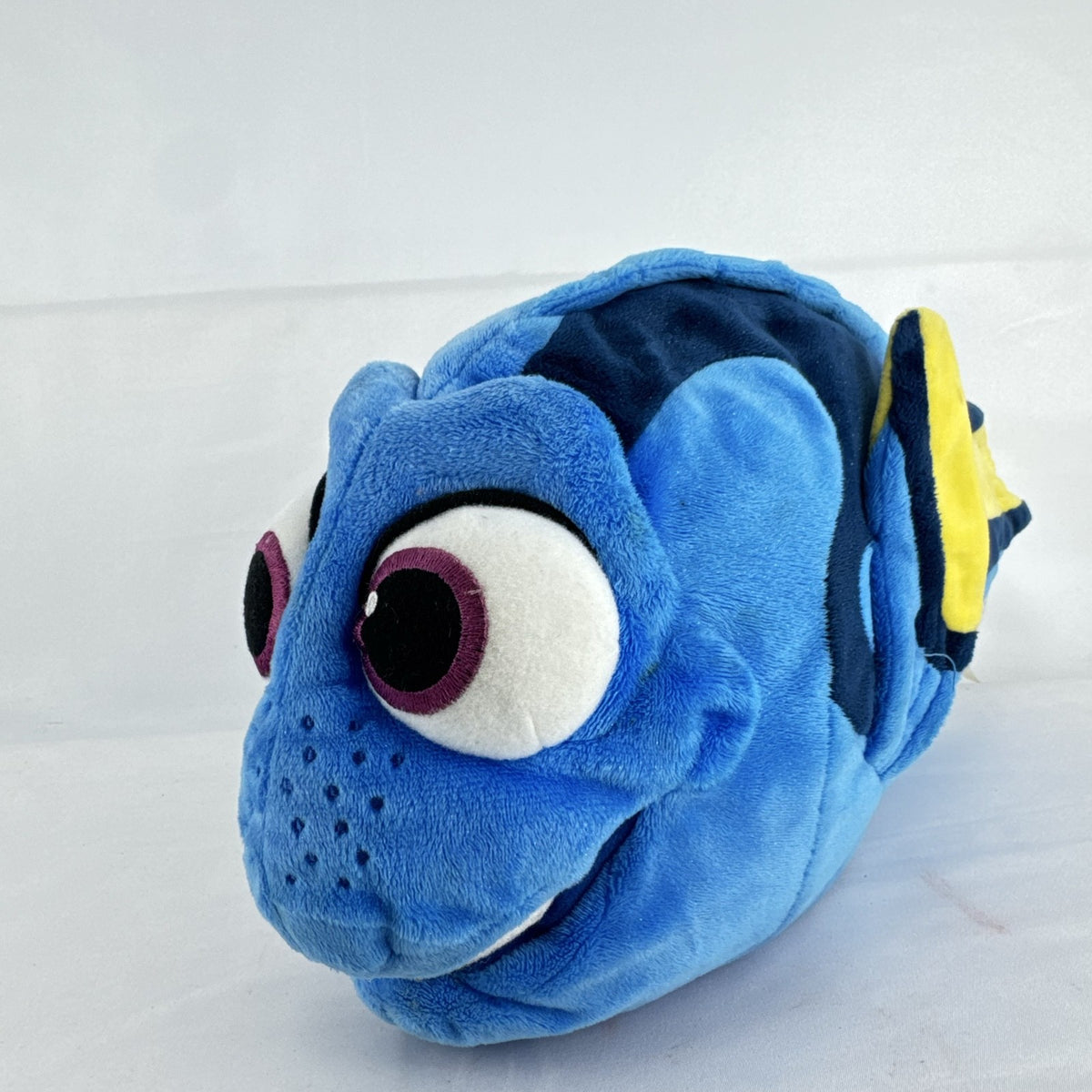 Disney Store Finding Dory 14-inch blue tang fish plush stuffed toy with yellow tracking tag