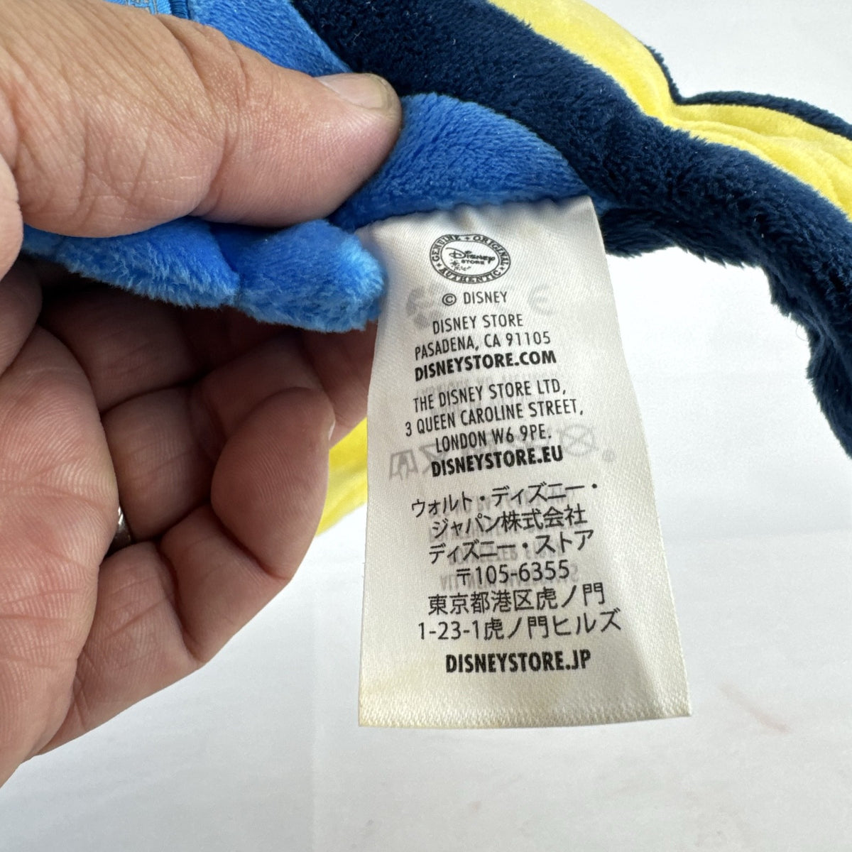 Disney Store Finding Dory 14-inch blue tang fish plush stuffed toy with yellow tracking tag
