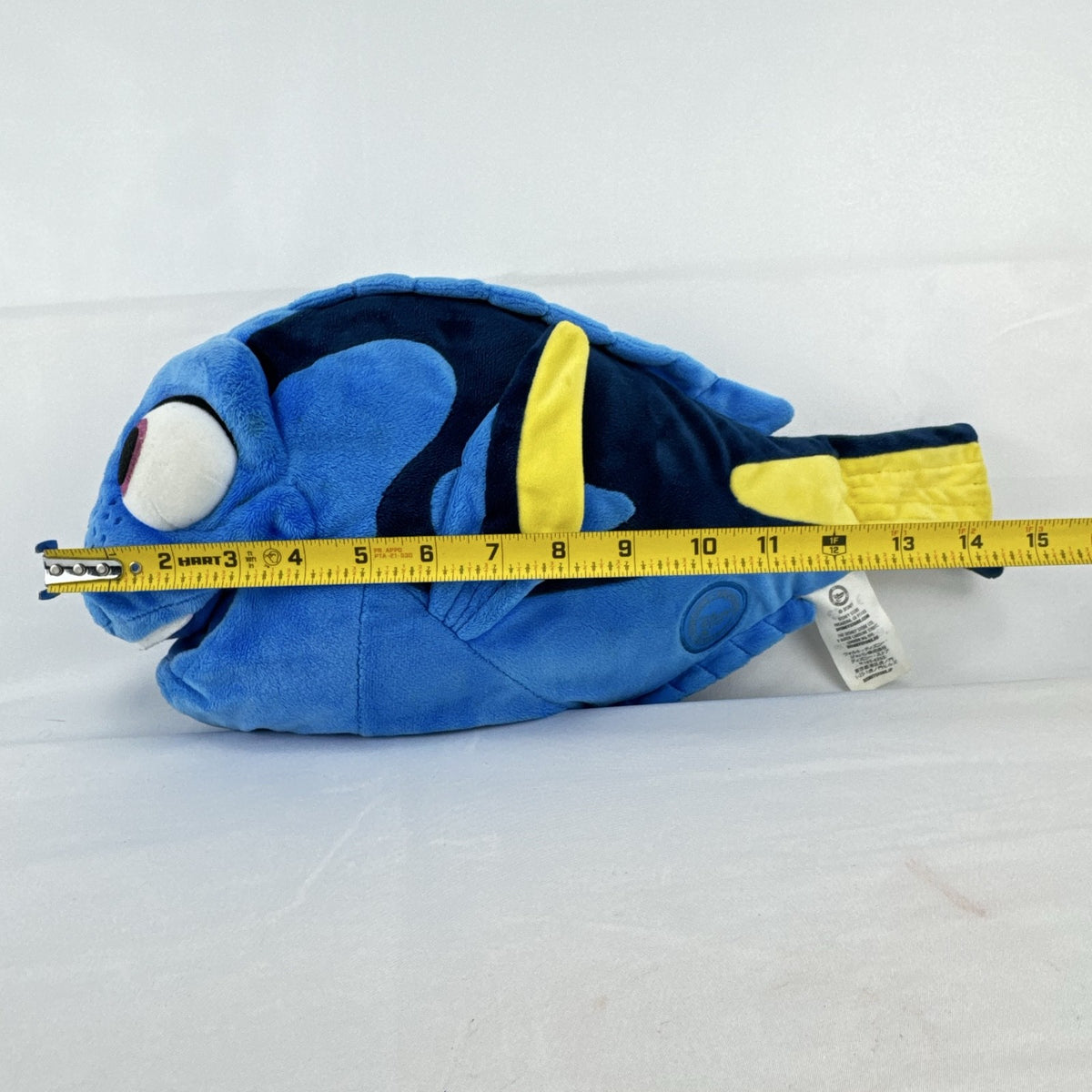 Disney Store Finding Dory 14-inch blue tang fish plush stuffed toy with yellow tracking tag