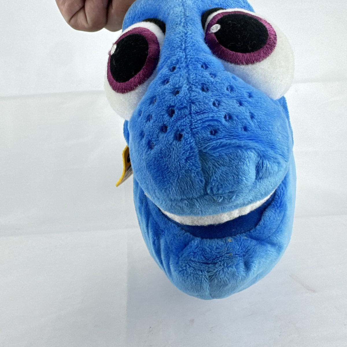 Disney Store Finding Dory 14-inch blue tang fish plush stuffed toy with yellow tracking tag