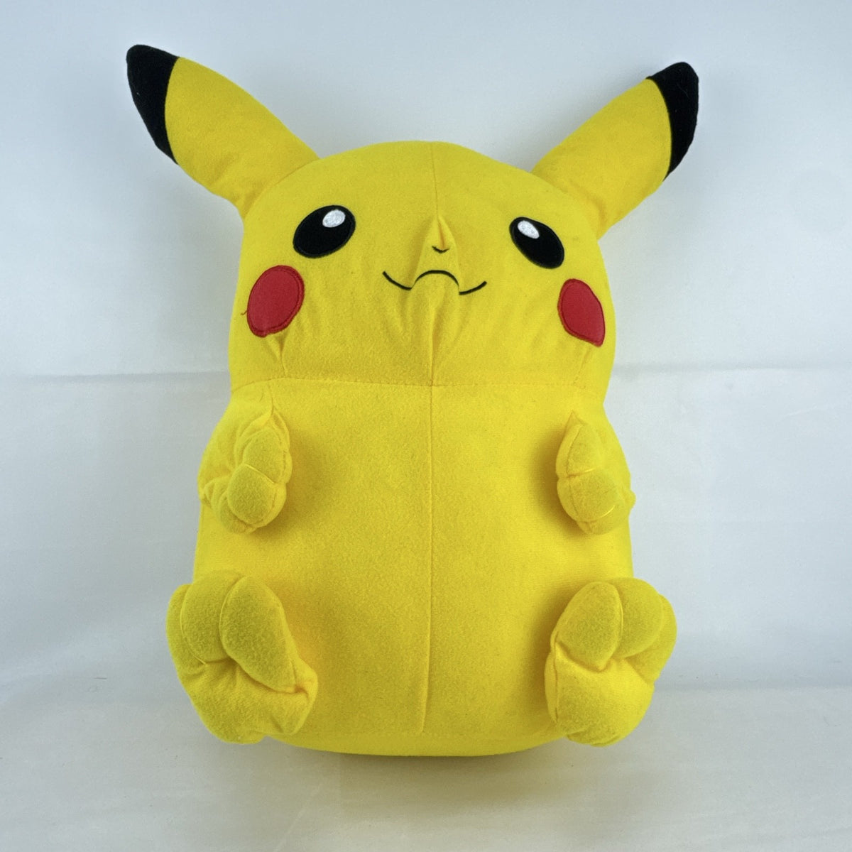 Vintage 1999 Pokémon chubby Pikachu 16-inch yellow plush stuffed animal with lightning bolt tail
