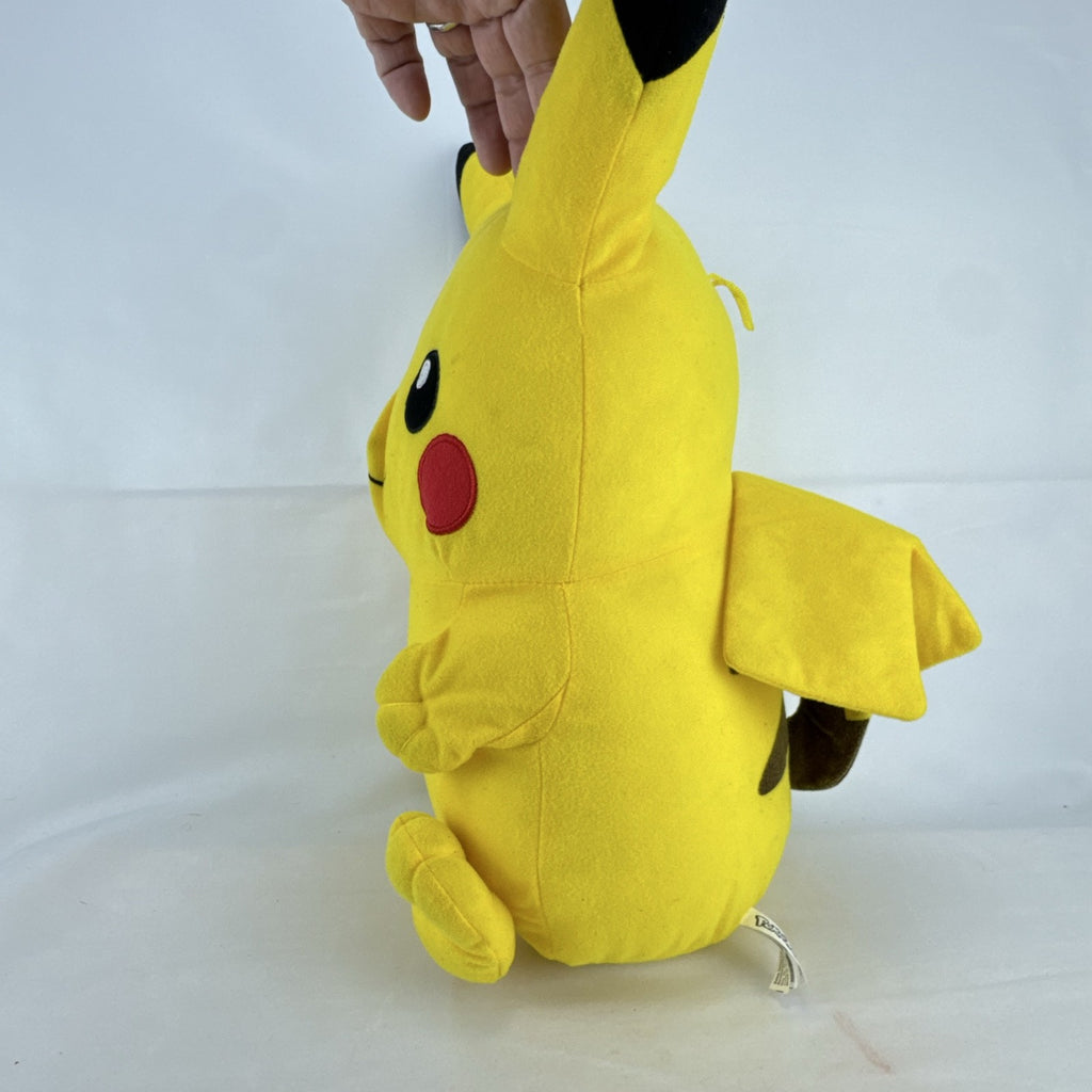 Vintage 1999 Pokémon chubby Pikachu 16-inch yellow plush stuffed animal with lightning bolt tail