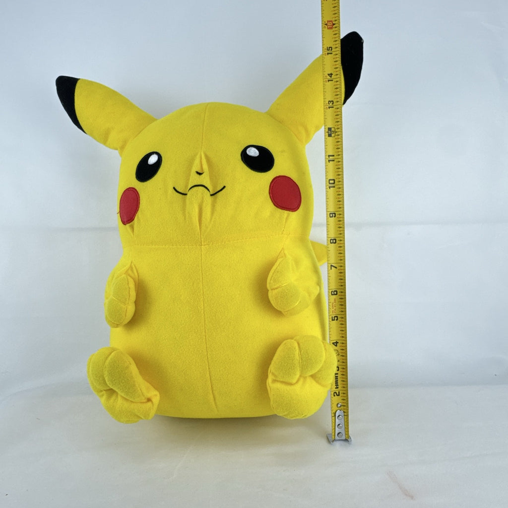 Vintage 1999 Pokémon chubby Pikachu 16-inch yellow plush stuffed animal with lightning bolt tail
