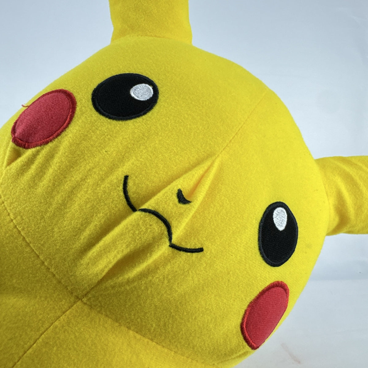 Vintage 1999 Pokémon chubby Pikachu 16-inch yellow plush stuffed animal with lightning bolt tail