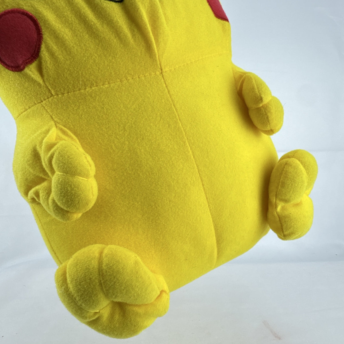 Vintage 1999 Pokémon chubby Pikachu 16-inch yellow plush stuffed animal with lightning bolt tail