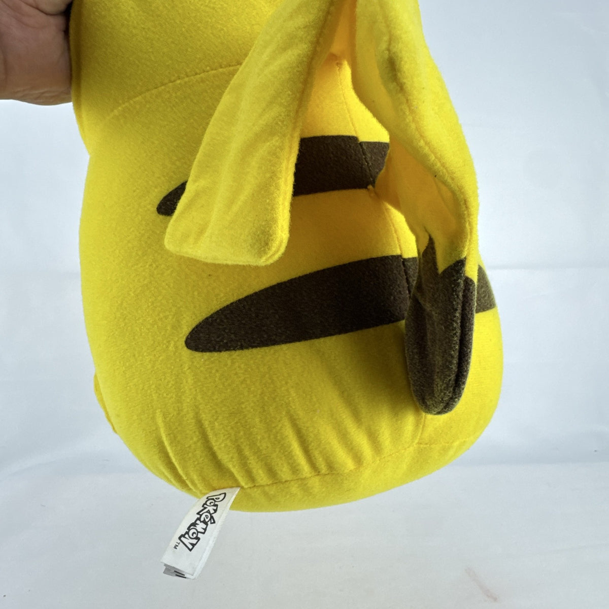 Vintage 1999 Pokémon chubby Pikachu 16-inch yellow plush stuffed animal with lightning bolt tail