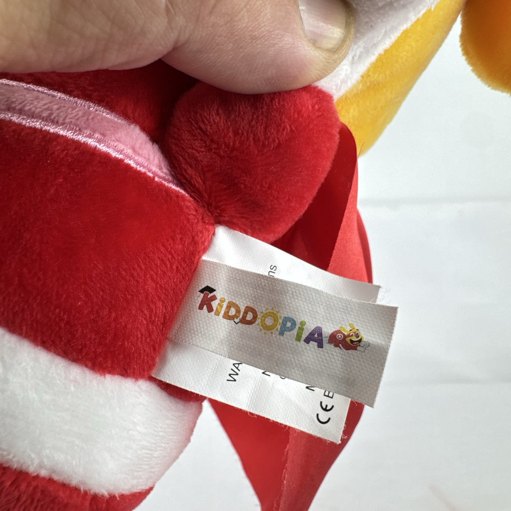 Kiddopia 12-inch yellow superhero dog plush toy wearing a red satin cape and embroidered eye mask.