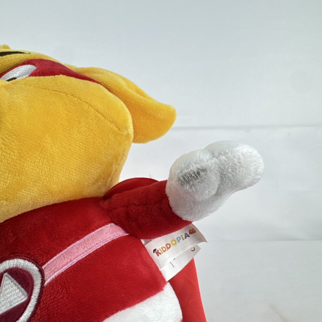 Kiddopia 12-inch yellow superhero dog plush toy wearing a red satin cape and embroidered eye mask.