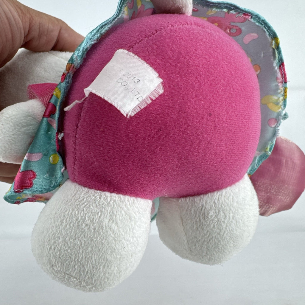 Sanrio Hello Kitty 9-inch plush doll wearing a teal candy print satin dress and holding a pink swirl lollipop.