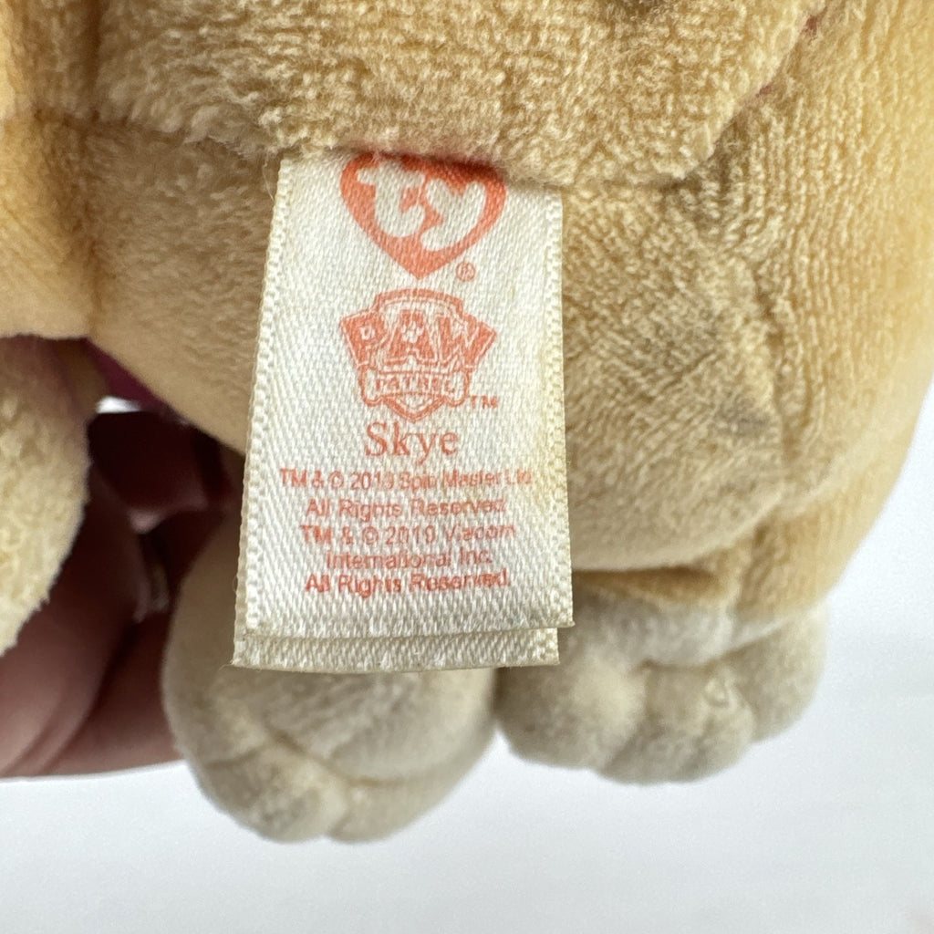 Ty PAW Patrol Beanie Boos Skye plush dog in pink aviator suit with pink glitter eyes