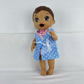 Hasbro Baby Alive 11-inch vinyl baby doll with molded brown hair, brown eyes, and blue polka dot dress