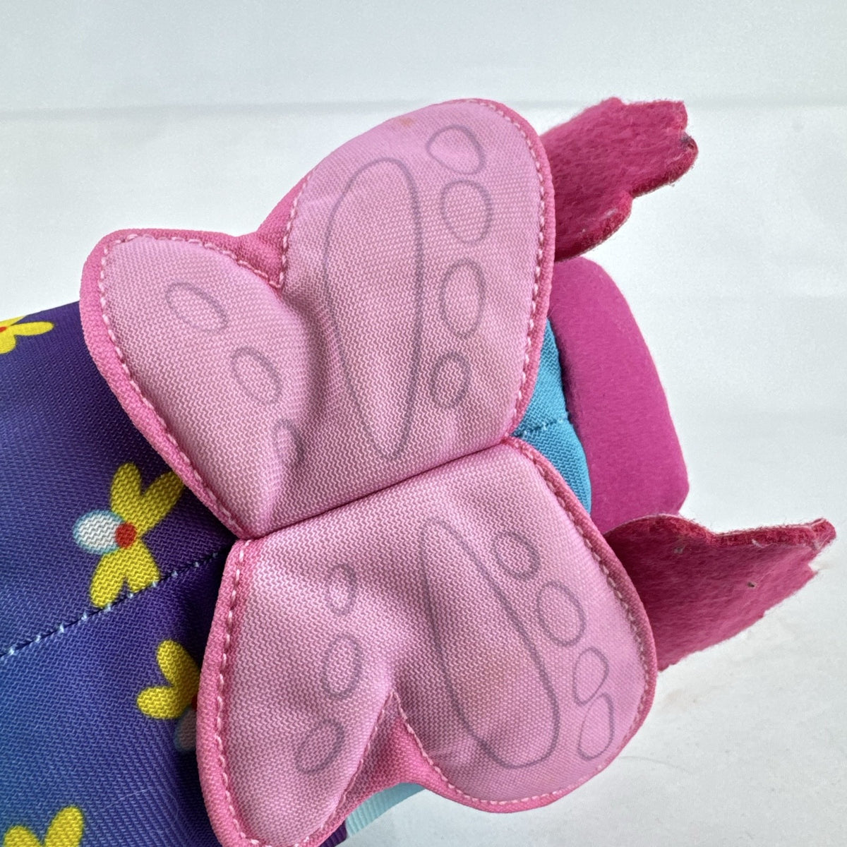 Sesame Street 50th Anniversary Abby Cadabby fairy roll plush stuffed toy with wings and floral pattern