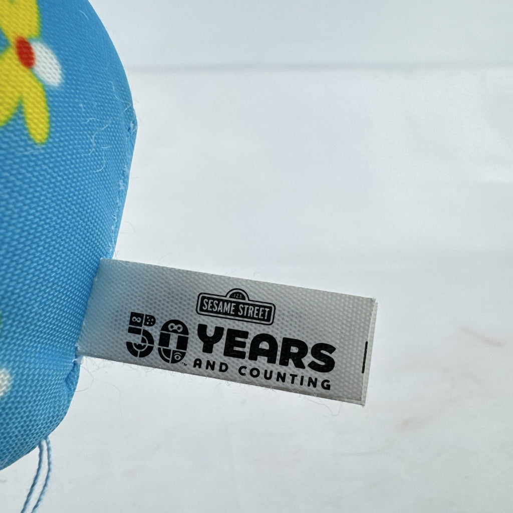 Sesame Street 50th Anniversary Abby Cadabby fairy roll plush stuffed toy with wings and floral pattern