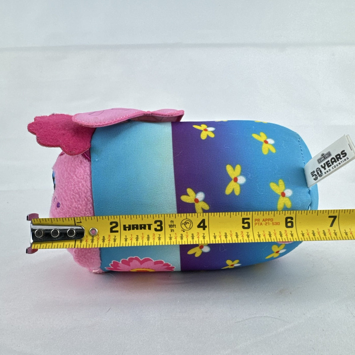Sesame Street 50th Anniversary Abby Cadabby fairy roll plush stuffed toy with wings and floral pattern