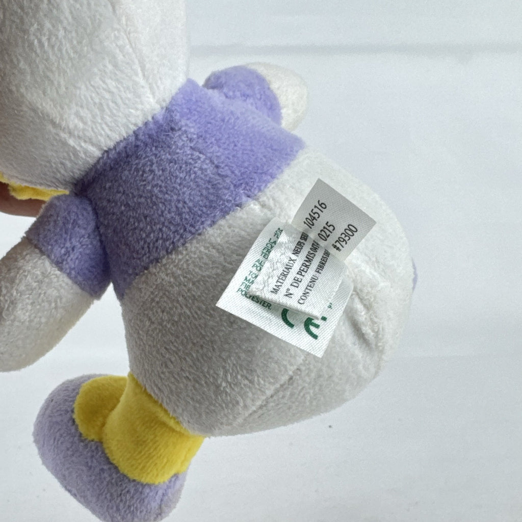 Kids Preferred Disney Baby Daisy Duck seated plush in purple outfit with pink bow